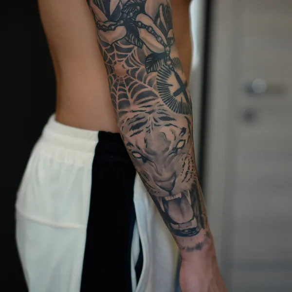 Lettering tattoo by Андрей Тихомиров in Saint Petersburg
