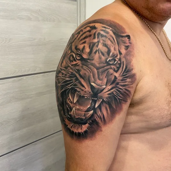 Lettering tattoo by Андрей Тихомиров in Saint Petersburg