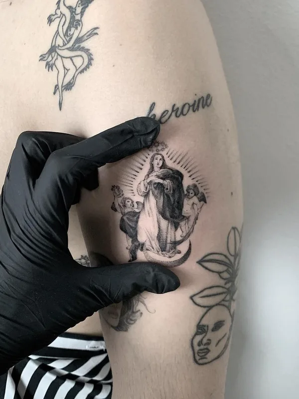 black and grey black and grey tattoo on upper arm #41788 | Tattoo Artist Hernan Giamberardino