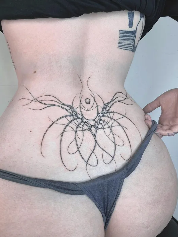female black linework Tatuaggio su lower back #66356 | Tatuatore Randy Lahaie