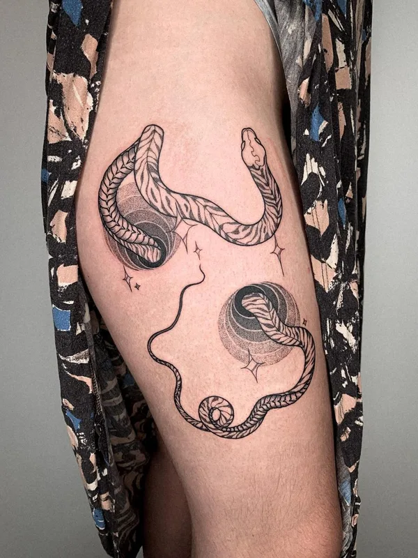 Graphic tattoo by Oliver’s Black Ink in Amsterdam