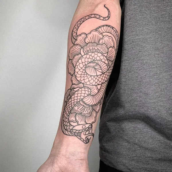 Graphic tattoo by Oliver’s Black Ink in Amsterdam