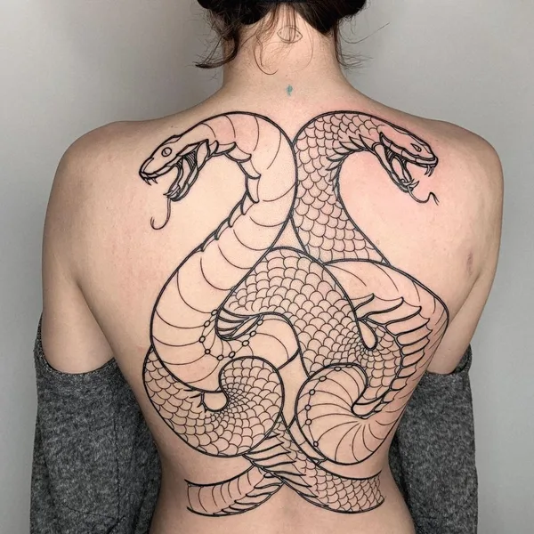 Graphic tattoo by Oliver’s Black Ink in Amsterdam