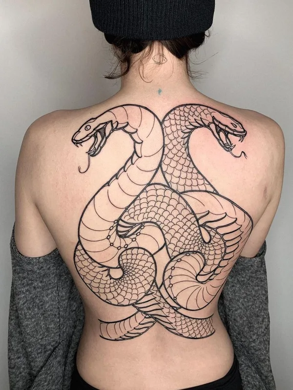 Graphic tattoo by Oliver’s Black Ink in Amsterdam