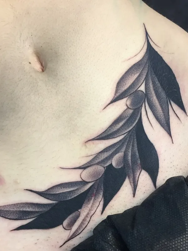 black and grey blackwork татуировка на stomach #46778 | Тату мастер Иван Дзумик