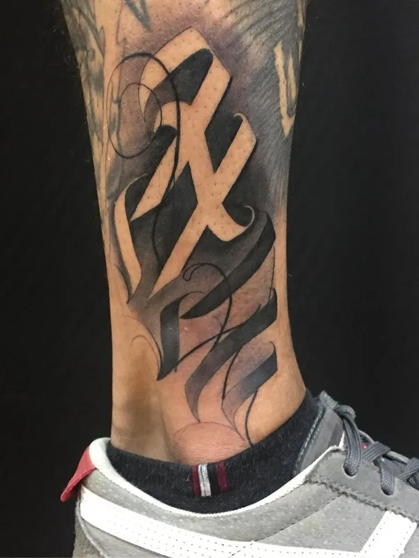 black and grey lettering татуировка на ankle #46788 | Тату мастер Иван Дзумик
