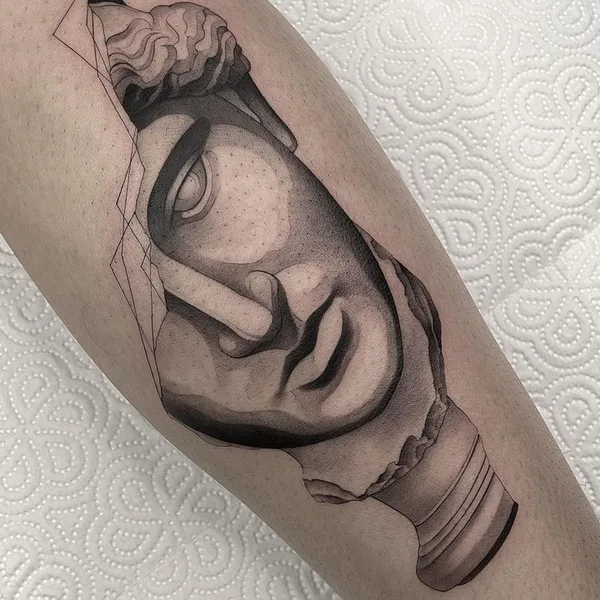 Graphic tattoo by Savaş Doğan in Istanbul