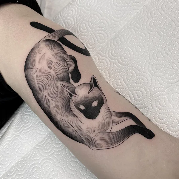 Graphic tattoo by Savaş Doğan in Istanbul