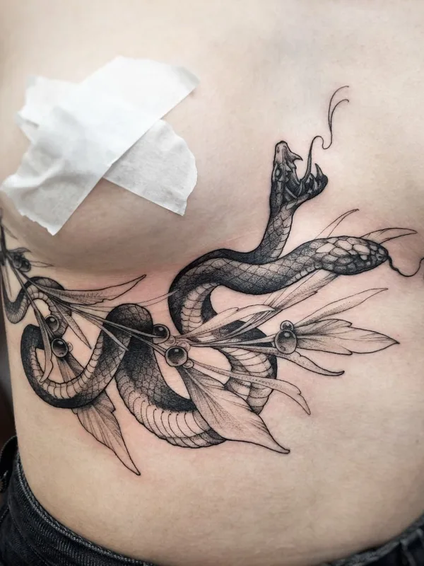 female black and grey blackwork tattoo auf chest #40173 | Tätowierer MaryAnn