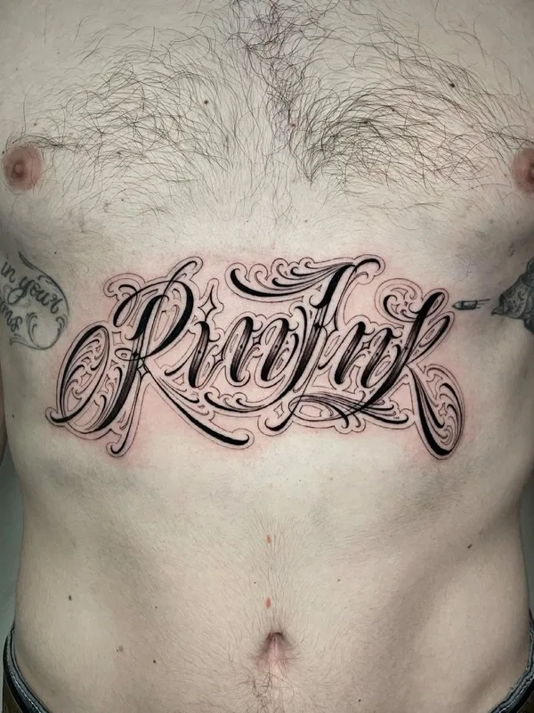 male black lettering татуировка на chest #41304 | Тату мастер Samuele Ventura