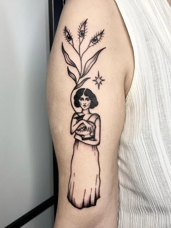 female black and grey illustrative Tatuaggio su upper arm #45184 | Tatuatore Mickey Ink