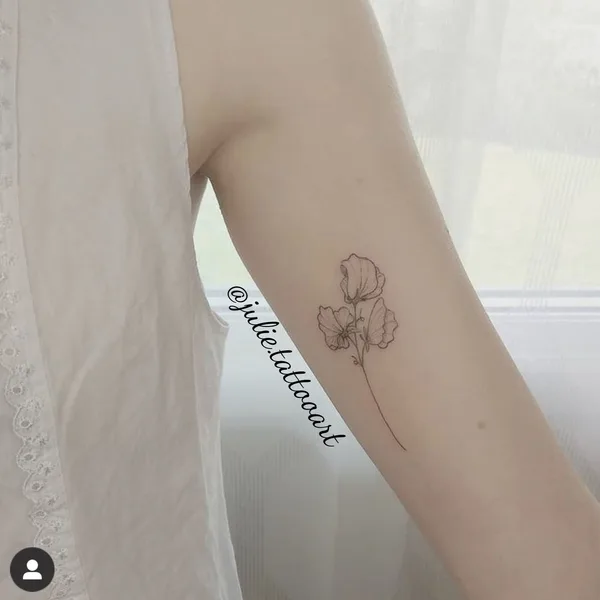 Graphic tattoo by Juliane Visser in Snells Beach