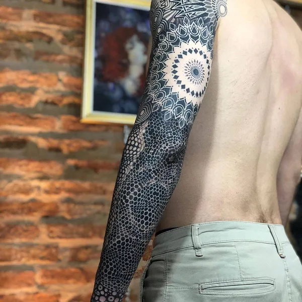 Ornamental tattoo by Eric Stricker in Barcelona