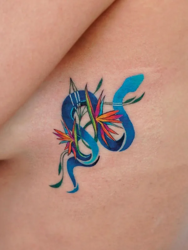 female color watercolor tatuaje en side #56805 | Tatuador Aleksandra Stojanoska