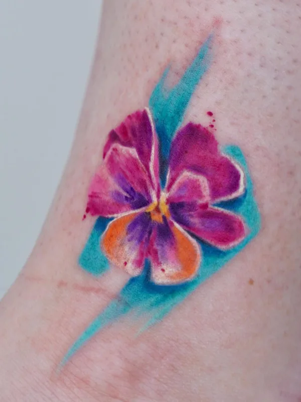 female color watercolor tatuaje en foot #56812 | Tatuador Aleksandra Stojanoska