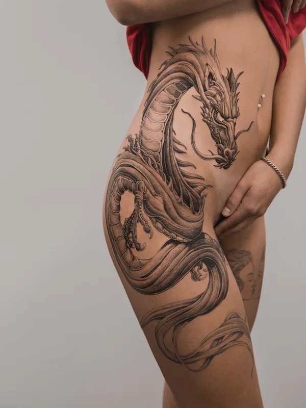 Graphic tattoo by Ezer in Paris