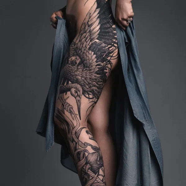 Graphic tattoo by Ezer in Paris