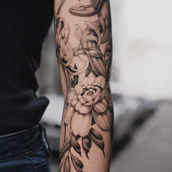 Graphic tattoo by Ezer in Paris