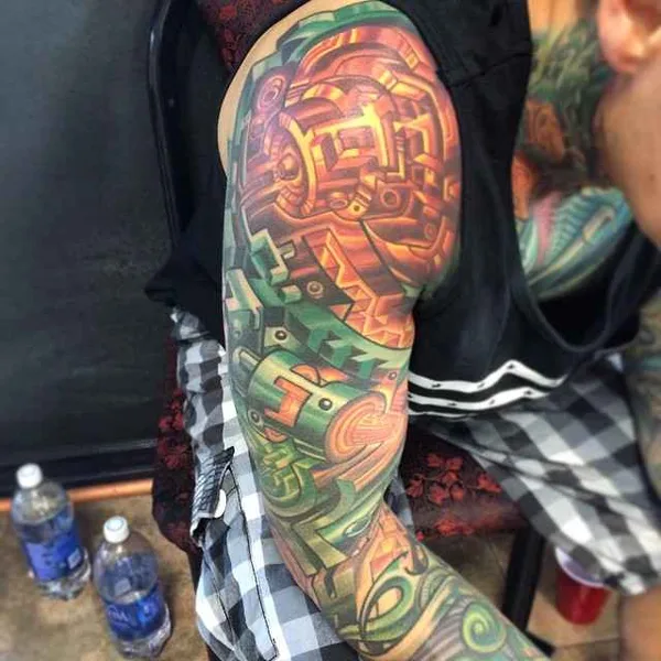 Biomechanical tattoo by Mike Cole