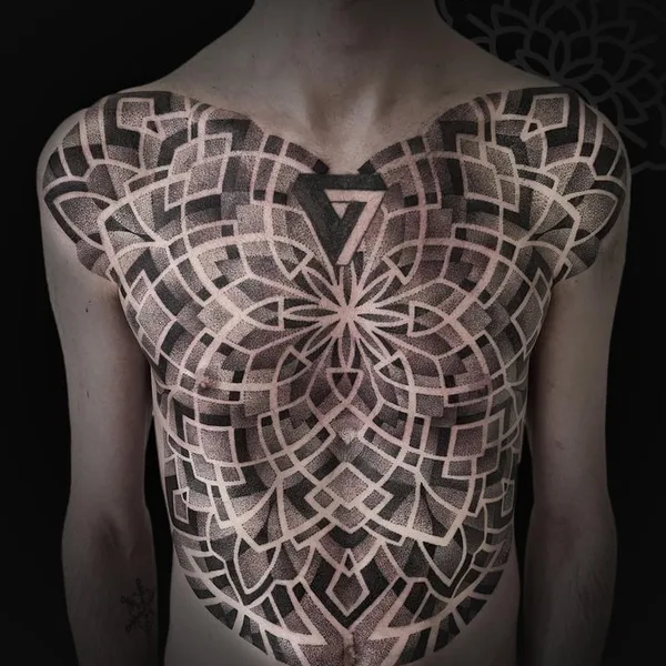 Ornamental tattoo by Jean Pierre Mottin in Liège