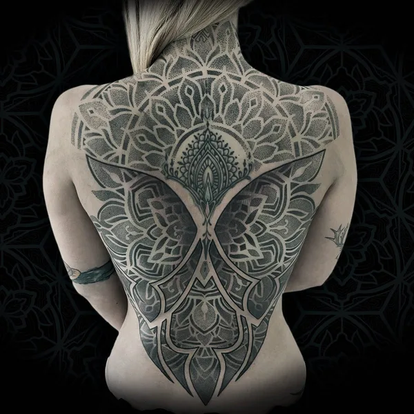 Ornamental tattoo by Jean Pierre Mottin in Liège