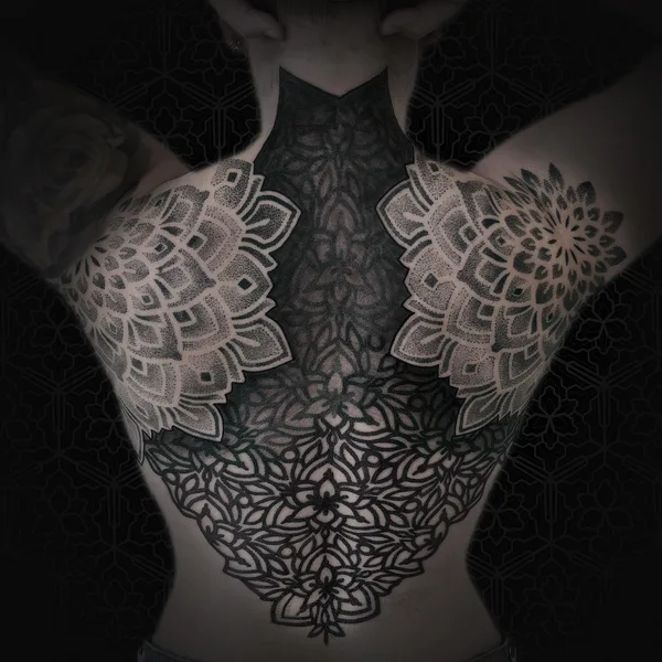 Ornamental tattoo by Jean Pierre Mottin in Liège