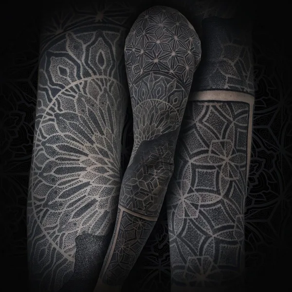 Ornamental tattoo by Jean Pierre Mottin in Liège