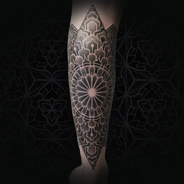 Ornamental tattoo by Jean Pierre Mottin in Liège