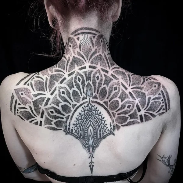 Ornamental tattoo by Jean Pierre Mottin in Liège