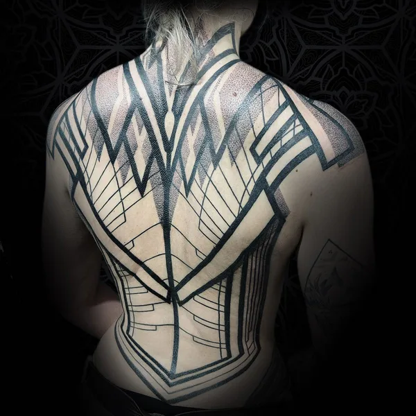 Ornamental tattoo by Jean Pierre Mottin in Liège