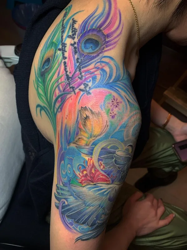 color watercolor tattoo on upper arm #55002 | Tattoo Artist Lu Xin