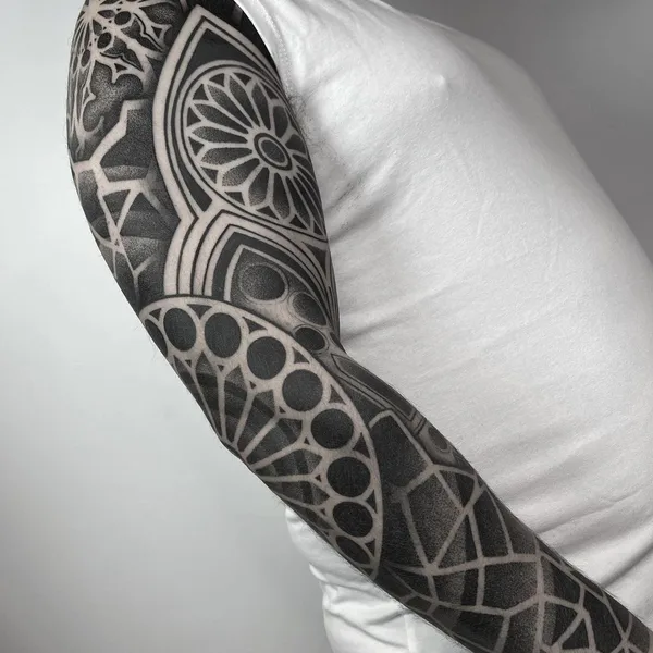 Ornamental tattoo by Raimundo Ramírez in Blanes