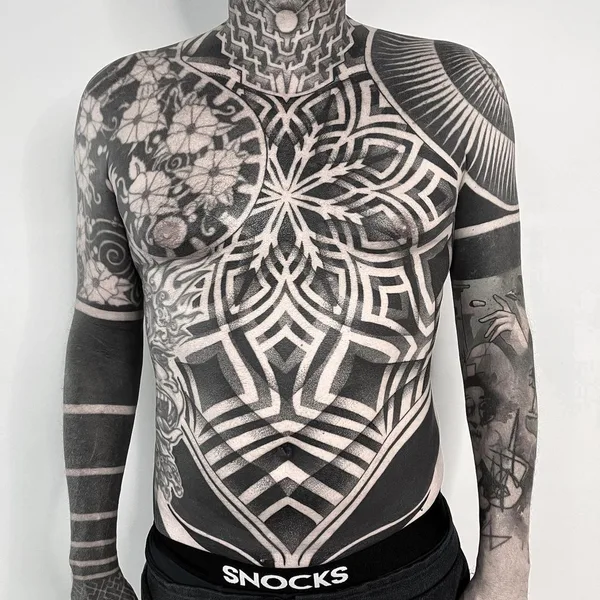 Ornamental tattoo by Raimundo Ramírez in Blanes
