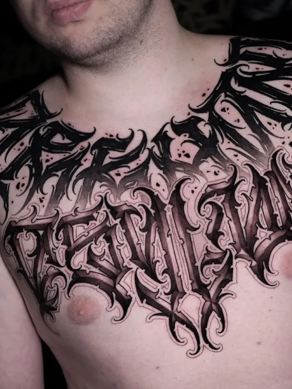 male black and grey lettering Tatuagem em chest #45604 | Tatuador Евгений Сидоров