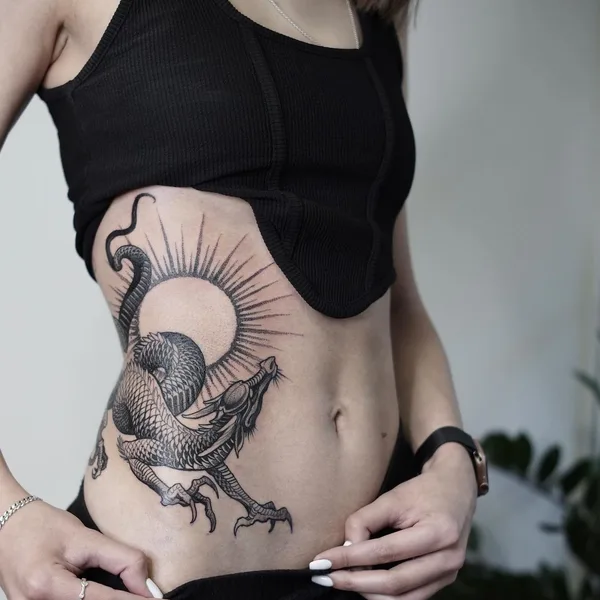 Graphic tattoo by Sasha Tabuns in Saint Petersburg