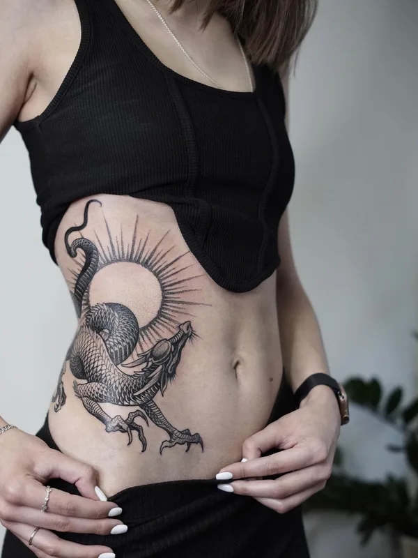 female black blackwork tattoo on side #45664 | Tattoo Artist Sasha Tabuns
