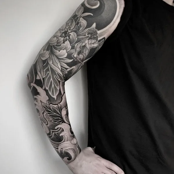 Graphic tattoo by Sasha Tabuns in Saint Petersburg