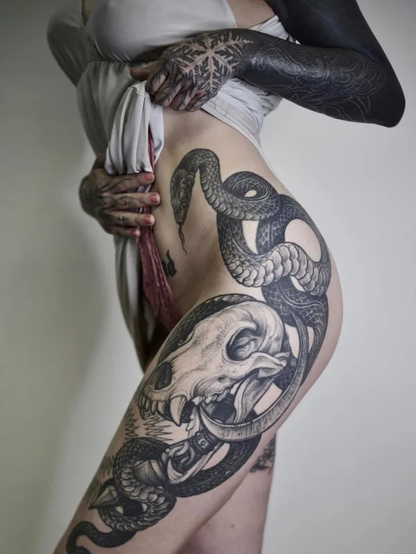 female black and grey blackwork tattoo on thigh #45672 | Tattoo Artist Sasha Tabuns