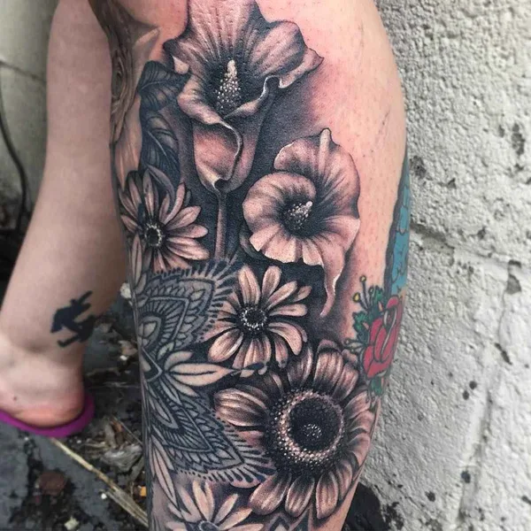Black tattoo by Ryan Ashley Malarkey