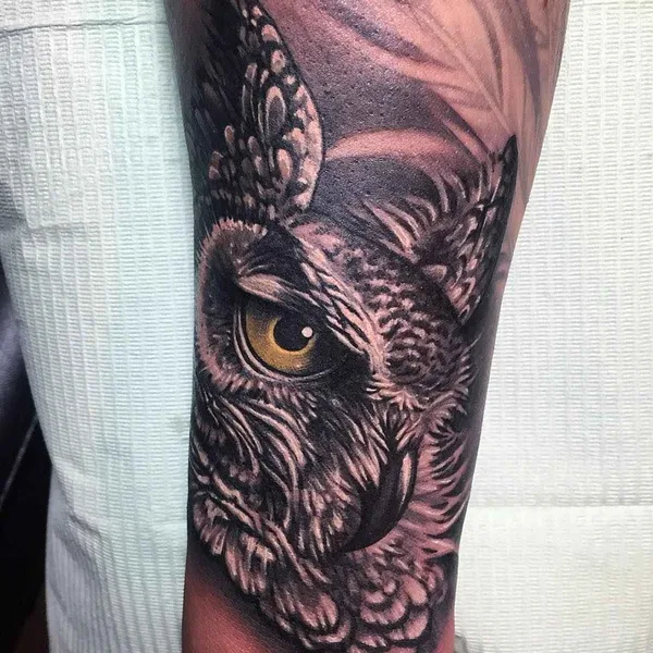 Black tattoo by Ryan Ashley Malarkey