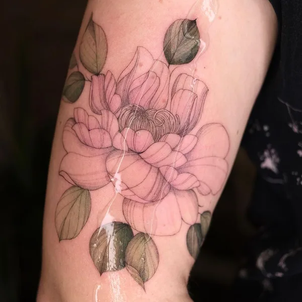 Feminine tattoo by Irina Kondrashova in Okres Praha