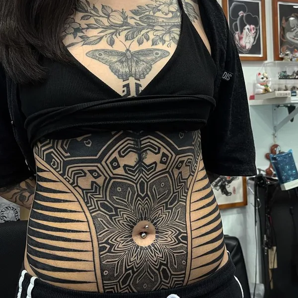 Ornamental tattoo by Nazareno Tubaro in Buenos Aires