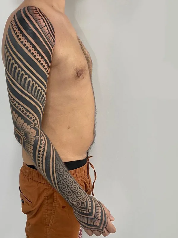 male black tribal tattoo auf full sleeve #64512 | Tätowierer Andrea Scollo