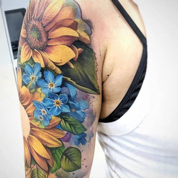 Watercolor tattoo by Lianne Moule in Chelmsford