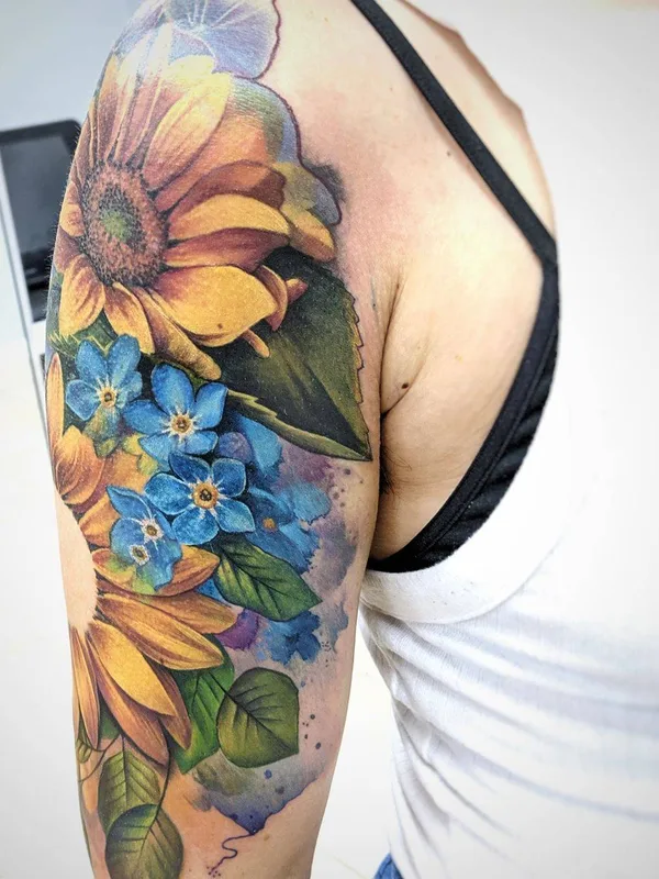 female color watercolor tattoo on upper arm #31732 | Tattoo Artist Lianne Moule
