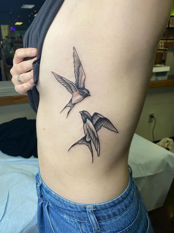 Graphic tattoo by Carl McReynolds in Little Rock