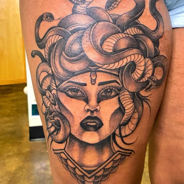 Graphic tattoo by Carl McReynolds in Little Rock
