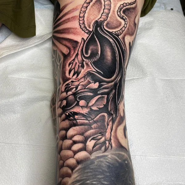 Graphic tattoo by Carl McReynolds in Little Rock