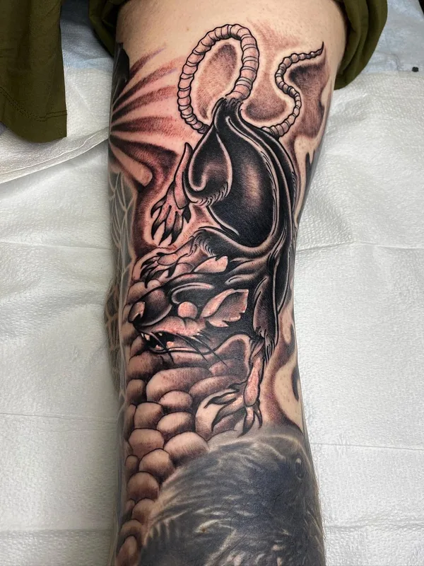 Graphic tattoo by Carl McReynolds in Little Rock
