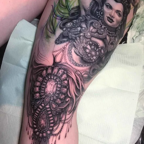 Black tattoo by Ryan Ashley Malarkey